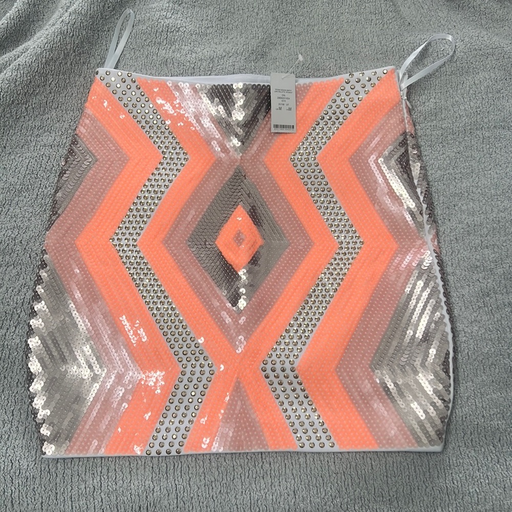 Sequin Bebe mini skirt, side zip, never worn, size medium